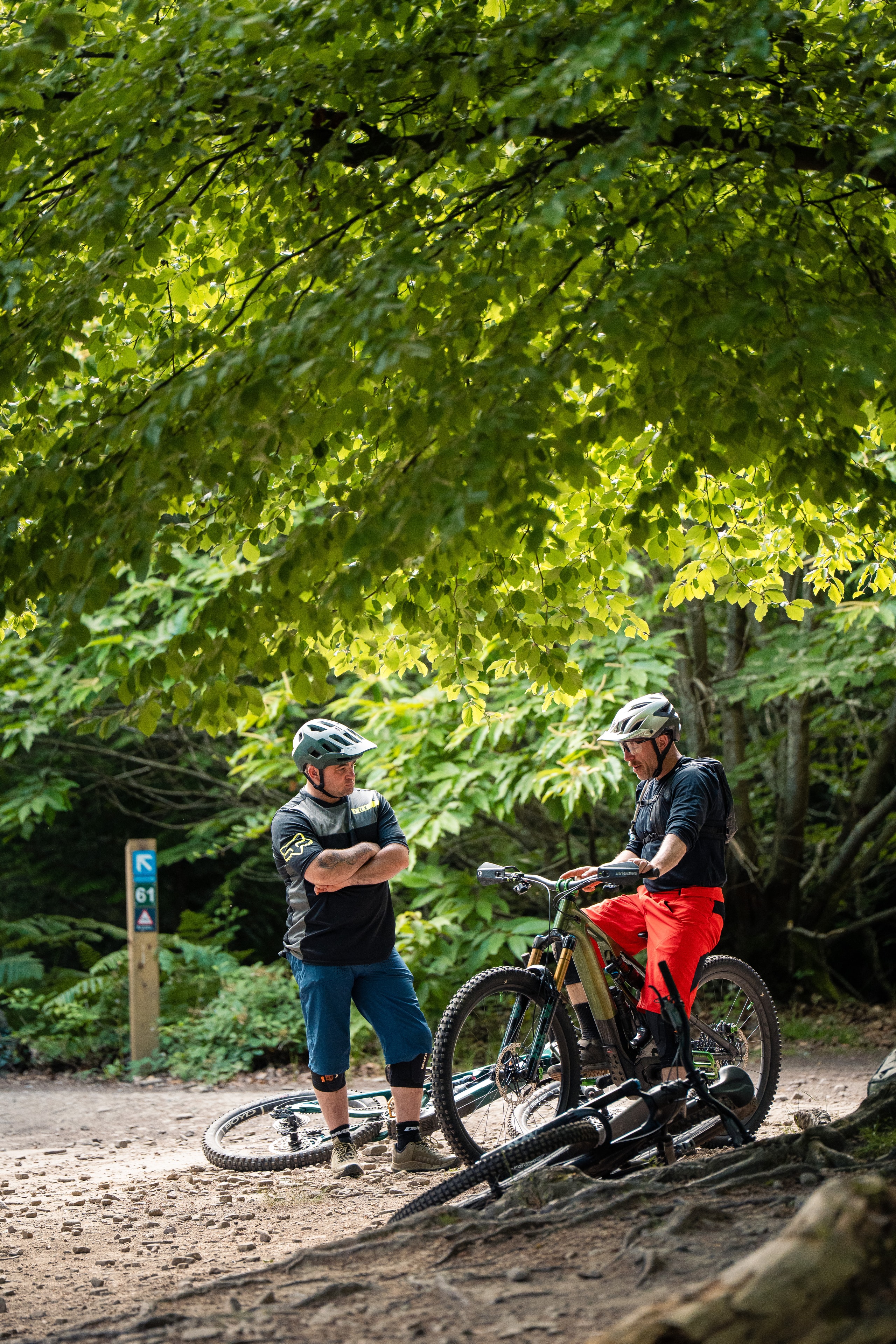 Two mountain bikers riding trails in the Forest of Dean for suspension setup session